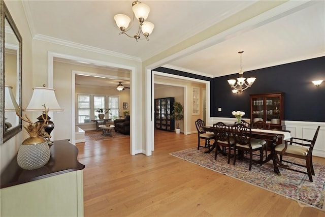 8813 Whitefield Ave, Savannah, GA 31406 - dining room featuring a chandelier, crown molding, and wood finished floors
