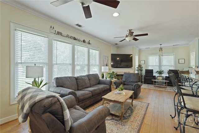 8813 Whitefield Ave, Savannah, GA 31406 - living area featuring ceiling fan, light wood-style flooring, ornamental molding, baseboards, and recessed lighting
