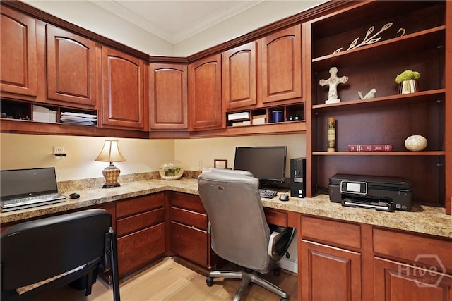 8813 Whitefield Ave, Savannah, GA 31406 - home office with built in desk, light wood-style flooring, and crown molding
