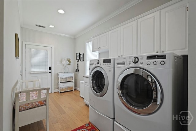 8813 Whitefield Ave, Savannah, GA 31406 - laundry area featuring independent washer and dryer, crown molding, cabinet space, light wood-style flooring, and recessed lighting