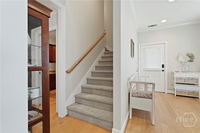 8813 Whitefield Ave, Savannah, GA 31406 - stairway featuring wood finished floors, crown molding, recessed lighting, and baseboards