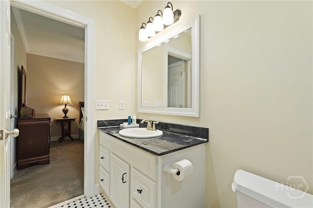 8813 Whitefield Ave, Savannah, GA 31406 - half bath with vanity, toilet, crown molding, and baseboards