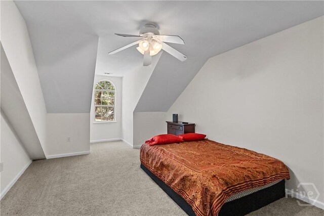 67 Oak Side Ct, Richmond Hill, GA 31324 - bedroom with carpet flooring, baseboards, lofted ceiling, and ceiling fan