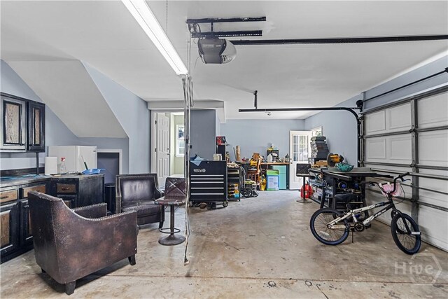 67 Oak Side Ct, Richmond Hill, GA 31324 - garage featuring a garage door opener