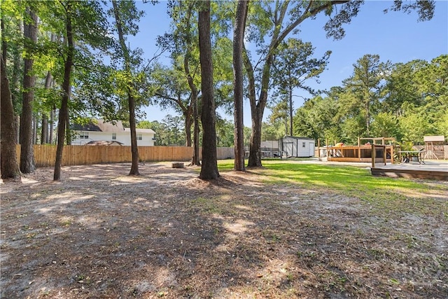 67 Oak Side Ct, Richmond Hill, GA 31324 - view of yard featuring a wooden deck
