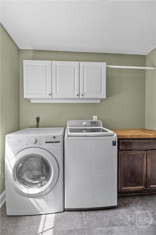 67 Oak Side Ct, Richmond Hill, GA 31324 - laundry room with cabinet space and washer and dryer