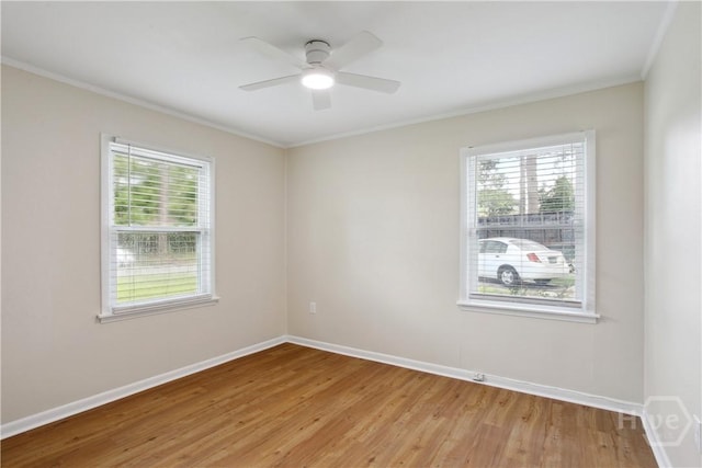 2301 Pinetree Rd, Savannah, GA 31404 - spare room featuring crown molding, plenty of natural light, light wood-type flooring, baseboards, and ceiling fan