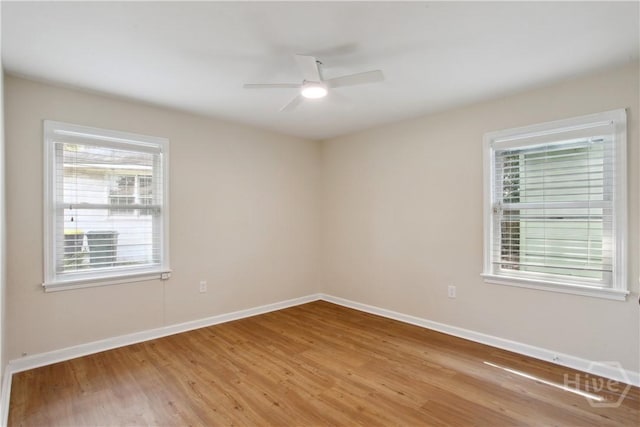 2301 Pinetree Rd, Savannah, GA 31404 - empty room with light wood finished floors, ceiling fan, and baseboards