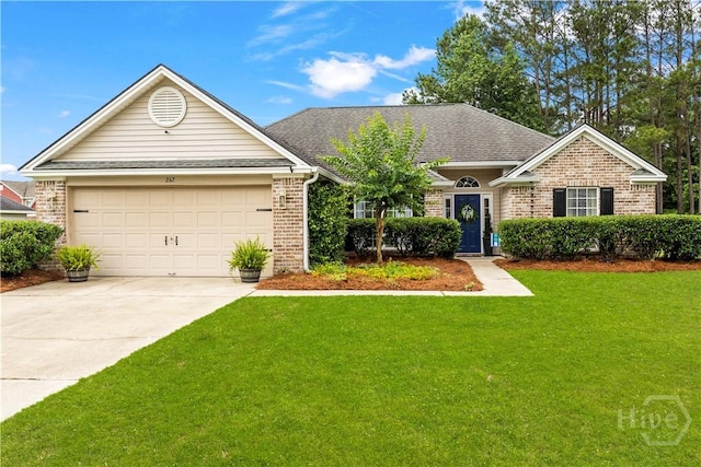 267 Jasper Ln, Rincon, GA 31326 - view of front of house featuring a front yard, brick siding, a garage, and concrete driveway