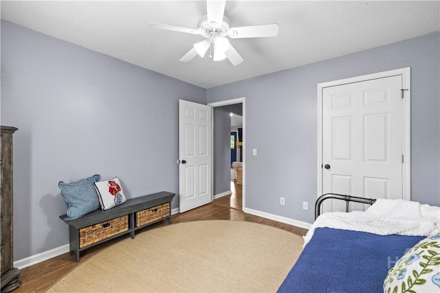 267 Jasper Ln, Rincon, GA 31326 - bedroom with wood finished floors, baseboards, and a ceiling fan