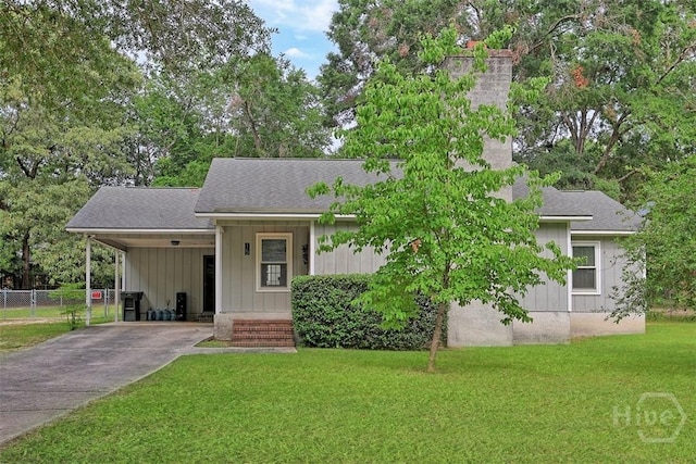 15 Ramble Rd, Statesboro, GA 30458 - view of front of property featuring concrete driveway, a carport, a shingled roof, and board and batten siding