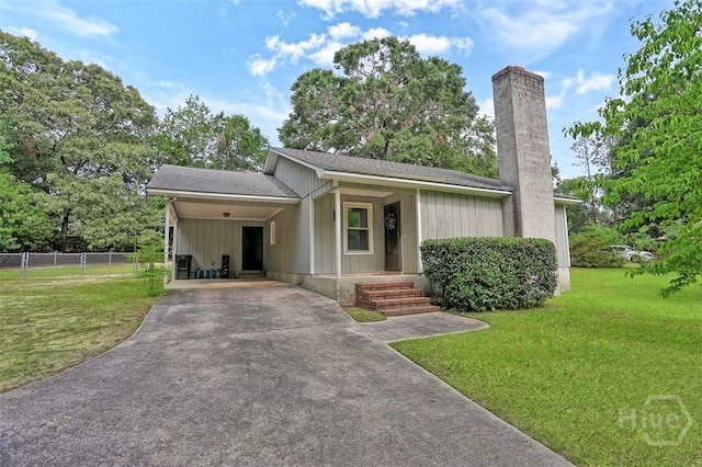 15 Ramble Rd, Statesboro, GA 30458 - ranch-style home featuring driveway, a chimney, and an attached carport