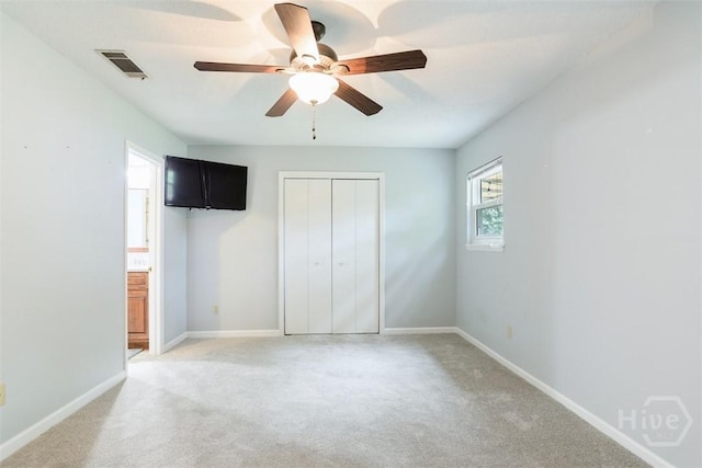 15 Ramble Rd, Statesboro, GA 30458 - unfurnished bedroom featuring light carpet, a closet, baseboards, and a ceiling fan