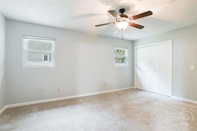 15 Ramble Rd, Statesboro, GA 30458 - unfurnished bedroom with light carpet, a closet, baseboards, and ceiling fan