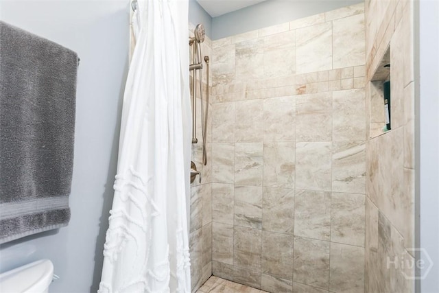 15 Ramble Rd, Statesboro, GA 30458 - bathroom with a tile shower and toilet