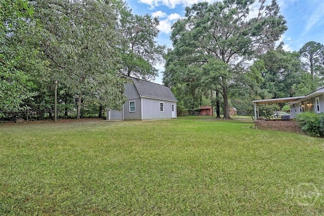 15 Ramble Rd, Statesboro, GA 30458 - view of green lawn with an outbuilding and a detached garage