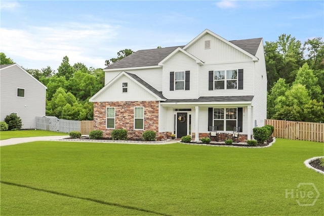 108 Summer Station Dr, Guyton, GA 31312 - view of front of property with board and batten siding, a porch, a gate, stone siding, and roof with shingles