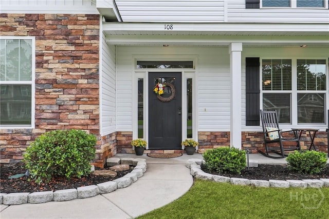 108 Summer Station Dr, Guyton, GA 31312 - entrance to property featuring a porch and stone siding