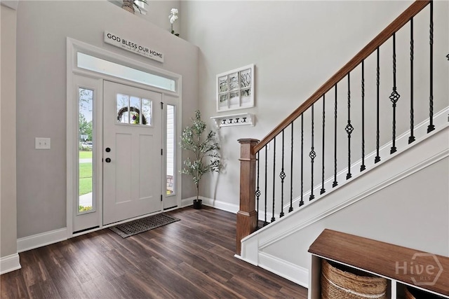 108 Summer Station Dr, Guyton, GA 31312 - entryway featuring baseboards, wood finished floors, stairs, and a high ceiling