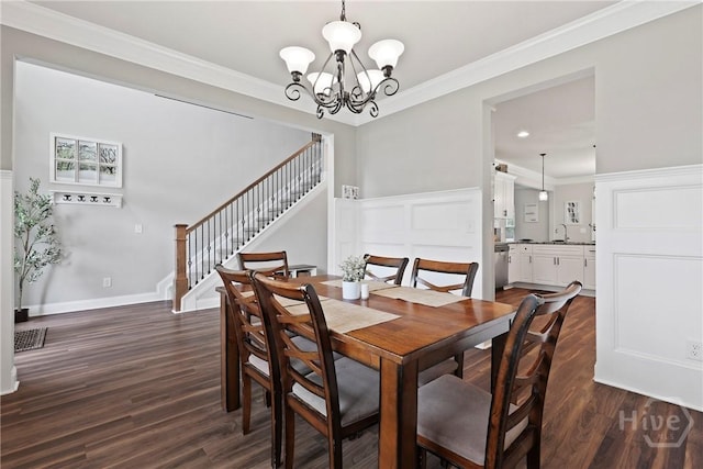 108 Summer Station Dr, Guyton, GA 31312 - dining room with stairs, dark wood-style flooring, a chandelier, crown molding, and recessed lighting