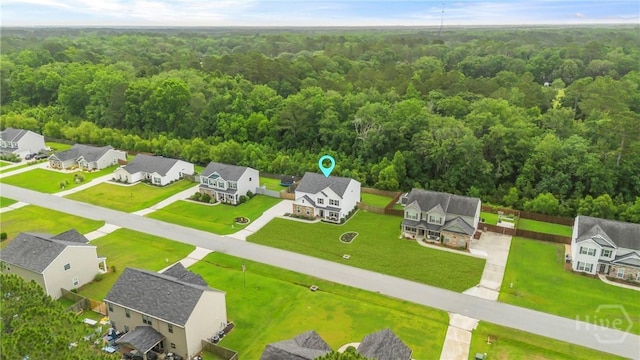 108 Summer Station Dr, Guyton, GA 31312 - aerial perspective of suburban area with a heavily wooded area