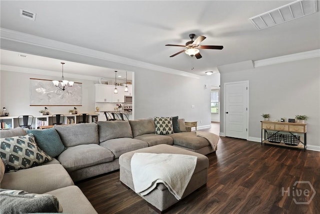 108 Summer Station Dr, Guyton, GA 31312 - living room with a ceiling fan, dark wood finished floors, a chandelier, ornamental molding, and baseboards