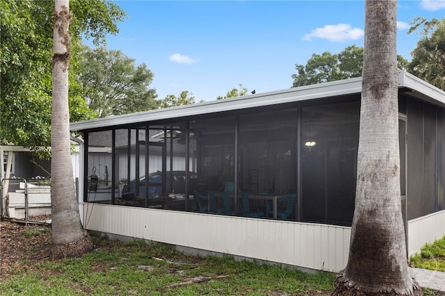 114 Piercefield Dr, Richmond Hill, GA 31324 - rear view of house featuring a sunroom