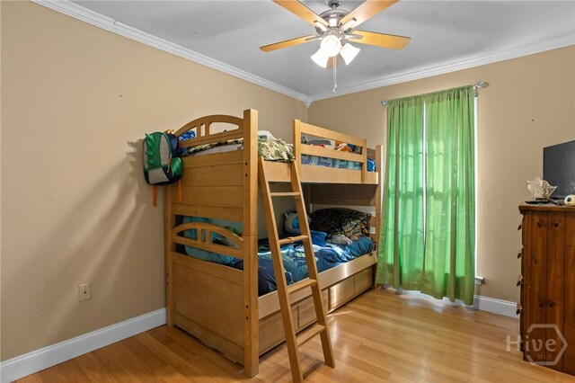 114 Piercefield Dr, Richmond Hill, GA 31324 - bedroom featuring wood finished floors, ornamental molding, and a ceiling fan
