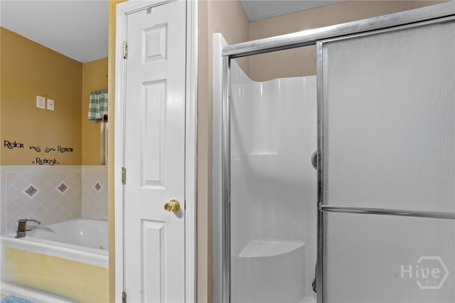 114 Piercefield Dr, Richmond Hill, GA 31324 - bathroom featuring a shower stall and a bath
