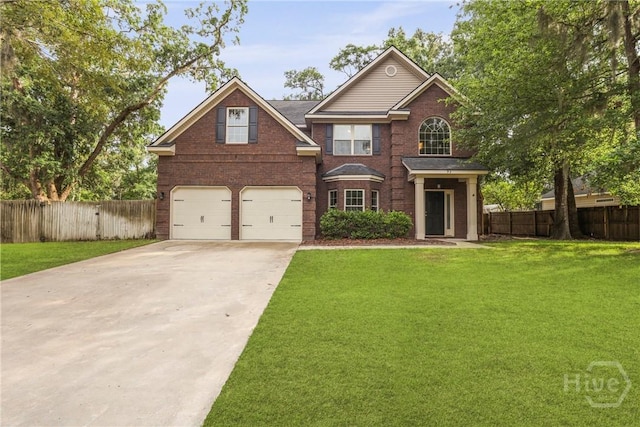 93 Veranda Trl, Midway, GA 31320 - traditional home featuring a garage, driveway, and brick siding