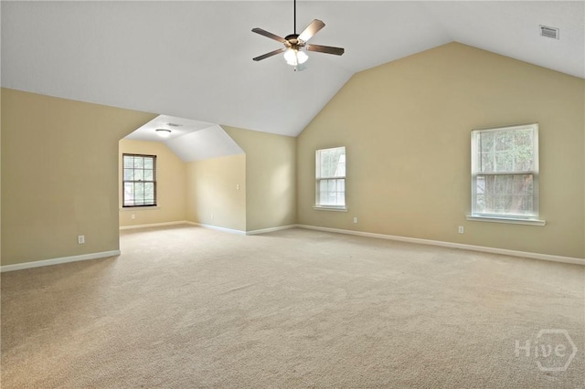 93 Veranda Trl, Midway, GA 31320 - additional living space with a ceiling fan, baseboards, lofted ceiling, plenty of natural light, and carpet floors