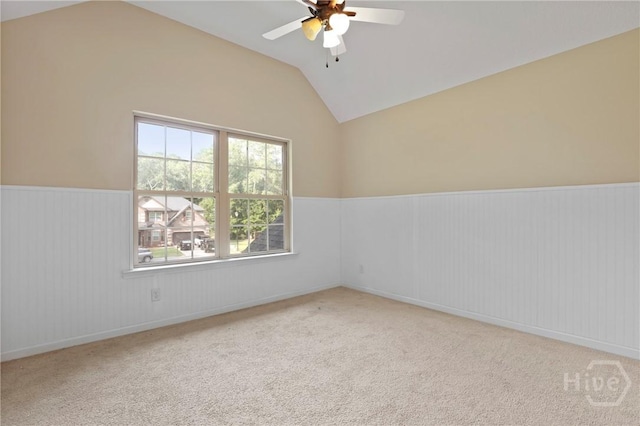 93 Veranda Trl, Midway, GA 31320 - carpeted empty room with lofted ceiling, a ceiling fan, and a wainscoted wall