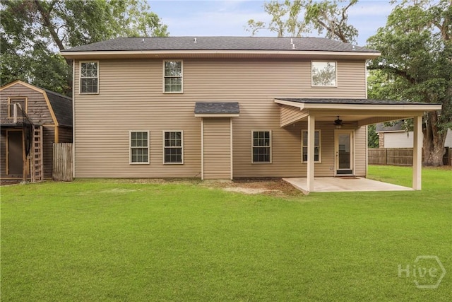 93 Veranda Trl, Midway, GA 31320 - back of house with a ceiling fan, a patio, and an outbuilding