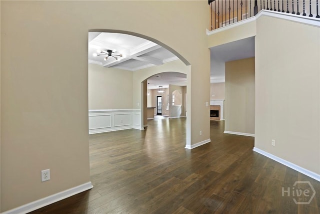 93 Veranda Trl, Midway, GA 31320 - entryway featuring a ceiling fan, crown molding, coffered ceiling, dark wood-style floors, and beamed ceiling