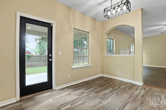 93 Veranda Trl, Midway, GA 31320 - doorway to outside with healthy amount of natural light, wood finished floors, and baseboards