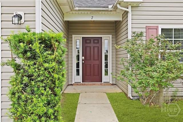 7 Sailmaker Ln, Richmond Hill, GA 31324 - entrance to property with roof with shingles