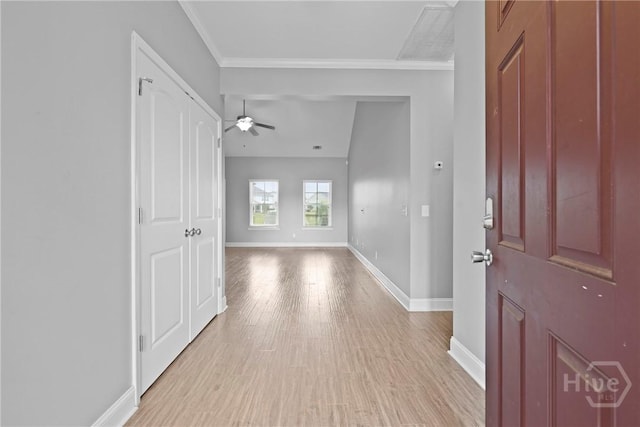 7 Sailmaker Ln, Richmond Hill, GA 31324 - foyer with baseboards, crown molding, ceiling fan, and light wood-style flooring