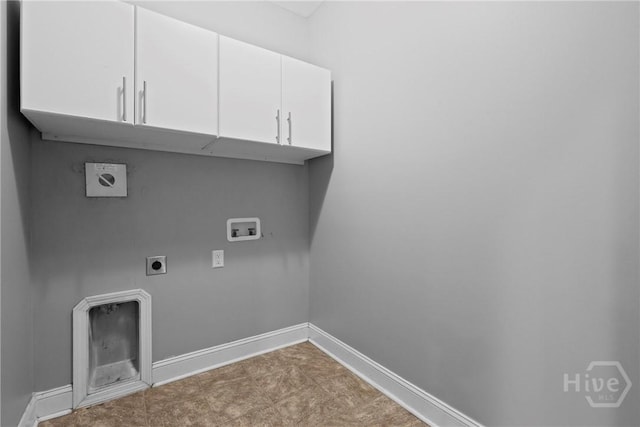 7 Sailmaker Ln, Richmond Hill, GA 31324 - laundry area with electric dryer hookup, cabinet space, hookup for a washing machine, and baseboards