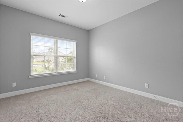7 Sailmaker Ln, Richmond Hill, GA 31324 - unfurnished room featuring light carpet and baseboards
