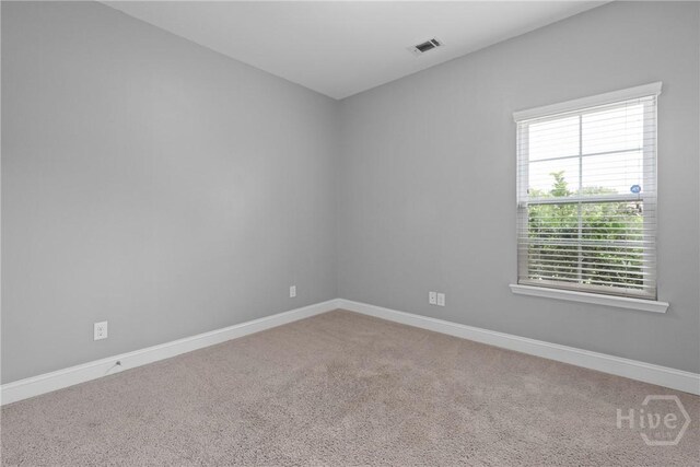 7 Sailmaker Ln, Richmond Hill, GA 31324 - carpeted spare room featuring baseboards