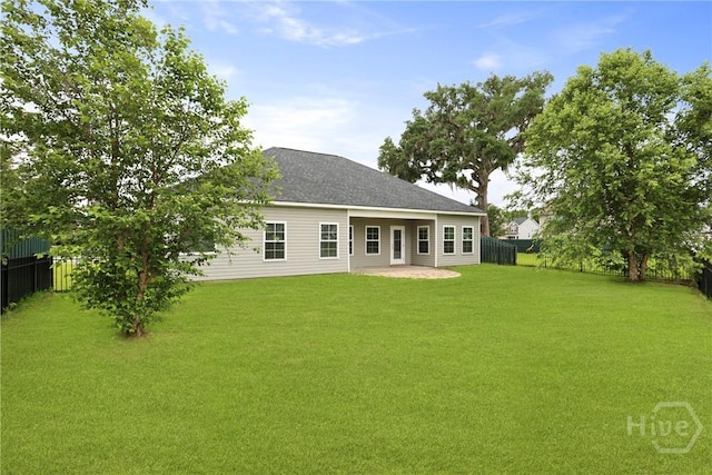 7 Sailmaker Ln, Richmond Hill, GA 31324 - back of house featuring a patio