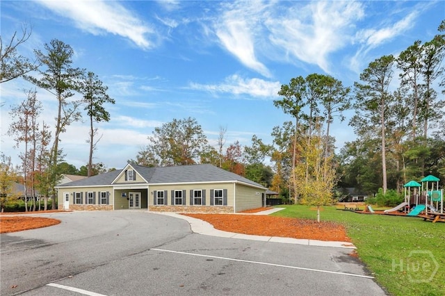 7 Sailmaker Ln, Richmond Hill, GA 31324 - view of building exterior featuring uncovered parking
