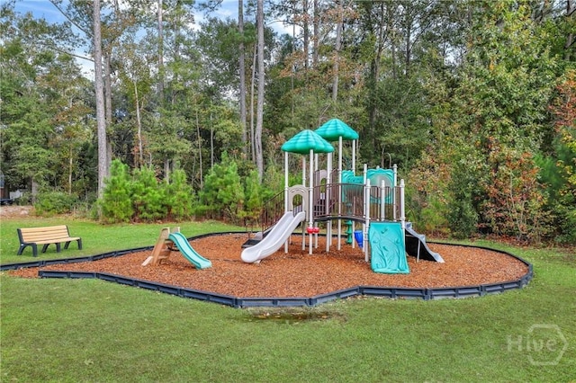 7 Sailmaker Ln, Richmond Hill, GA 31324 - community jungle gym featuring a lawn