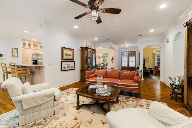 10 Cedar View Dr, Savannah, GA 31410 - living room with arched walkways, a ceiling fan, baseboards, ornamental molding, and recessed lighting