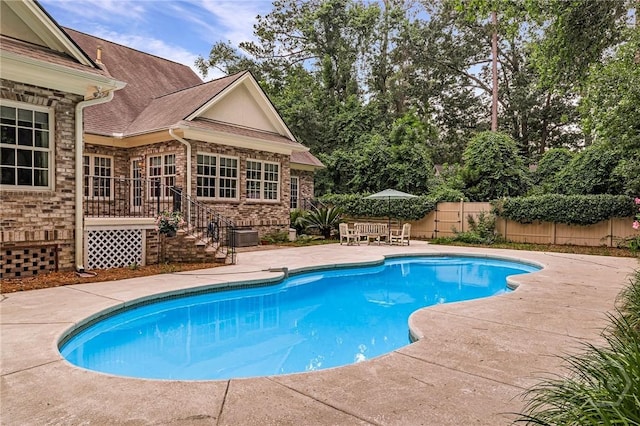 10 Cedar View Dr, Savannah, GA 31410 - view of swimming pool featuring a patio area and a fenced backyard