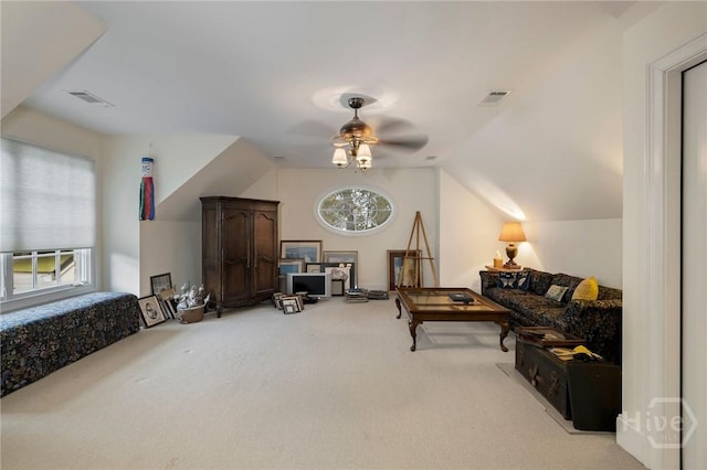 10 Cedar View Dr, Savannah, GA 31410 - living area featuring light colored carpet, plenty of natural light, ceiling fan, and lofted ceiling