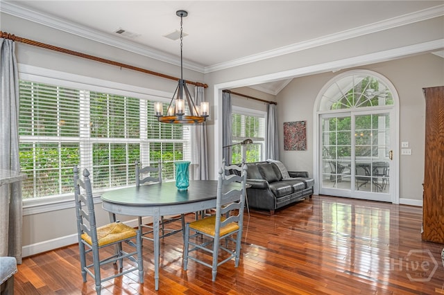 14 Black Hawk Trl, Savannah, GA 31411 - dining room with a chandelier, ornamental molding, baseboards, and wood finished floors