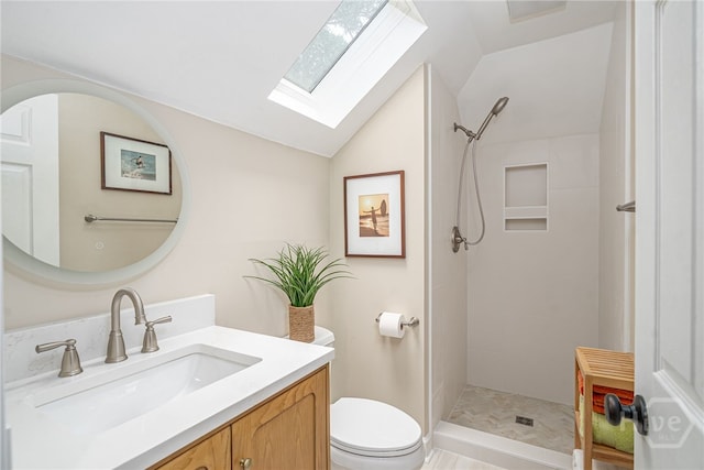 14 Black Hawk Trl, Savannah, GA 31411 - bathroom with a skylight, vanity, toilet, a tile shower, and vaulted ceiling