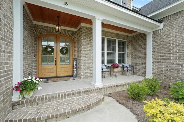 15 Reed Grass Ln, Savannah, GA 31405 - doorway to property with a porch, french doors, and brick siding