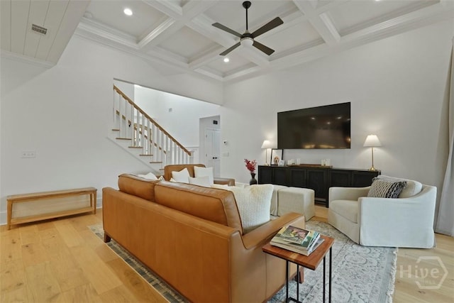 15 Reed Grass Ln, Savannah, GA 31405 - living room with light wood-style floors, beamed ceiling, coffered ceiling, stairway, and a ceiling fan